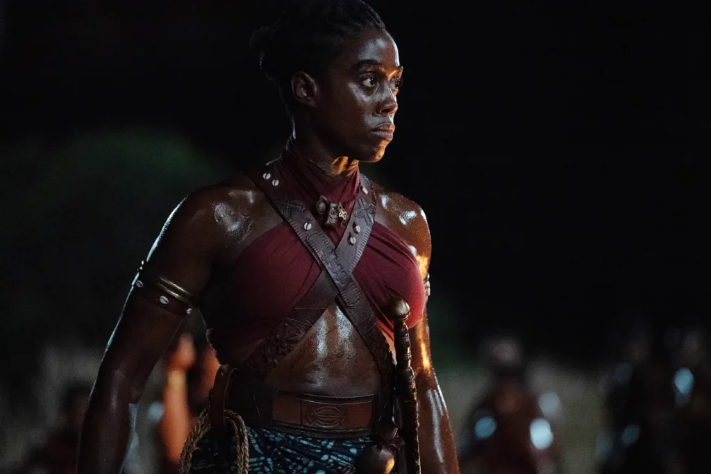 The woman king Agoji warrior, Izogie, stands ready for a fight